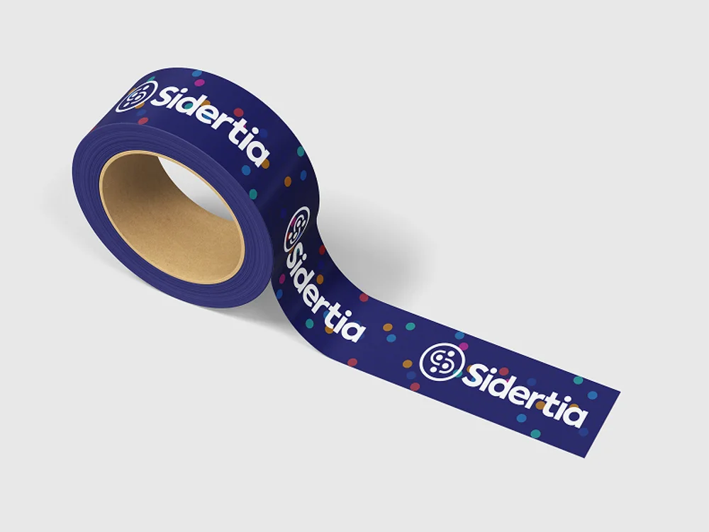 A roll of branded tape with the logo and data dots