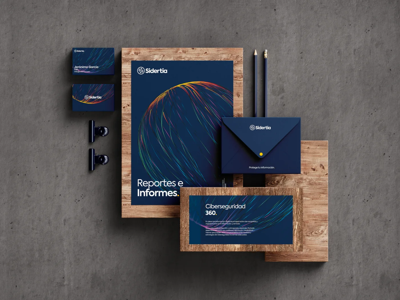 Stationery on a concrete table: folders, cards and an envelope with the light-line pattern